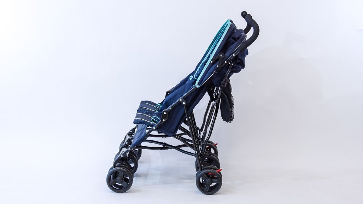 Compact double stroller folded for travel